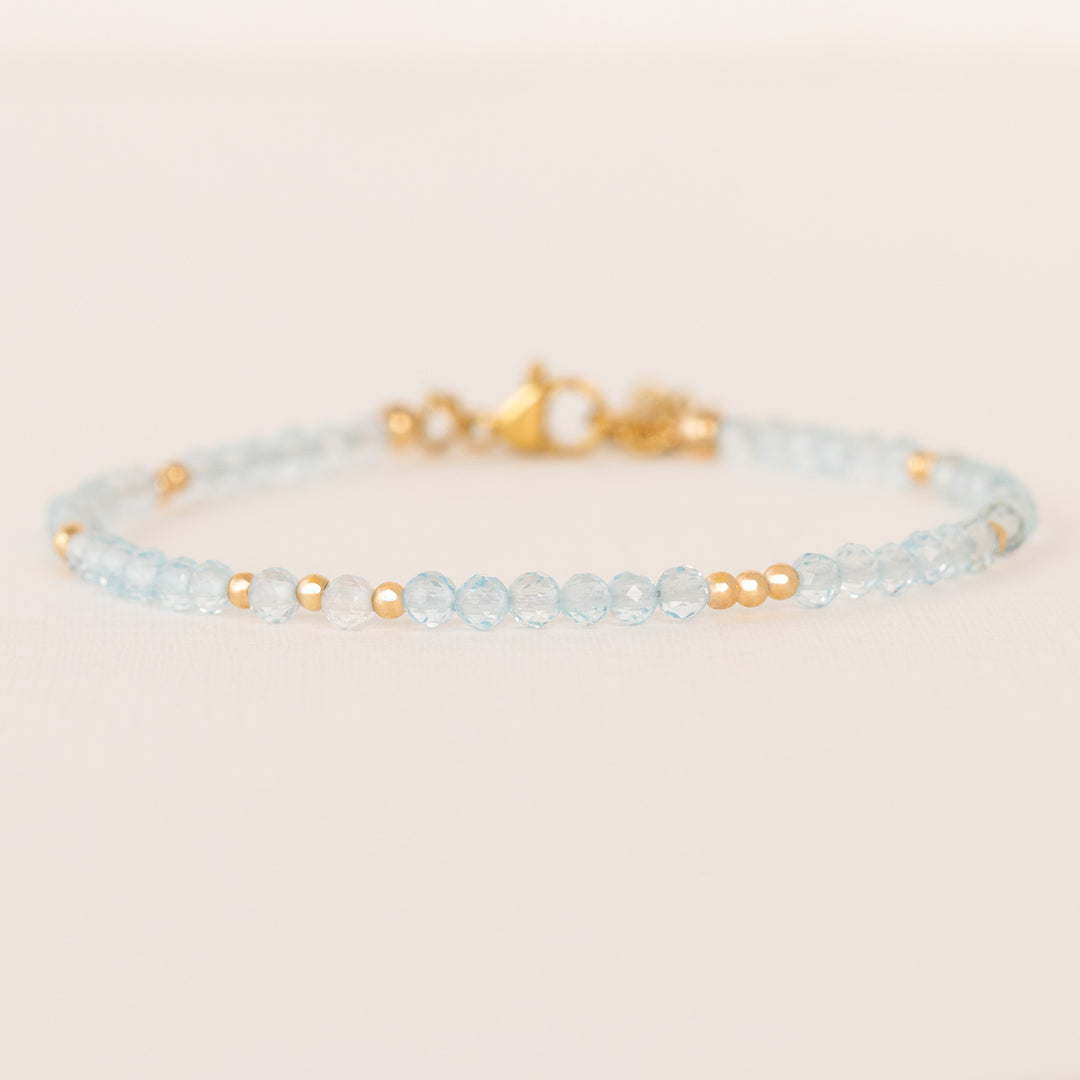 blue topaz bracelet gold