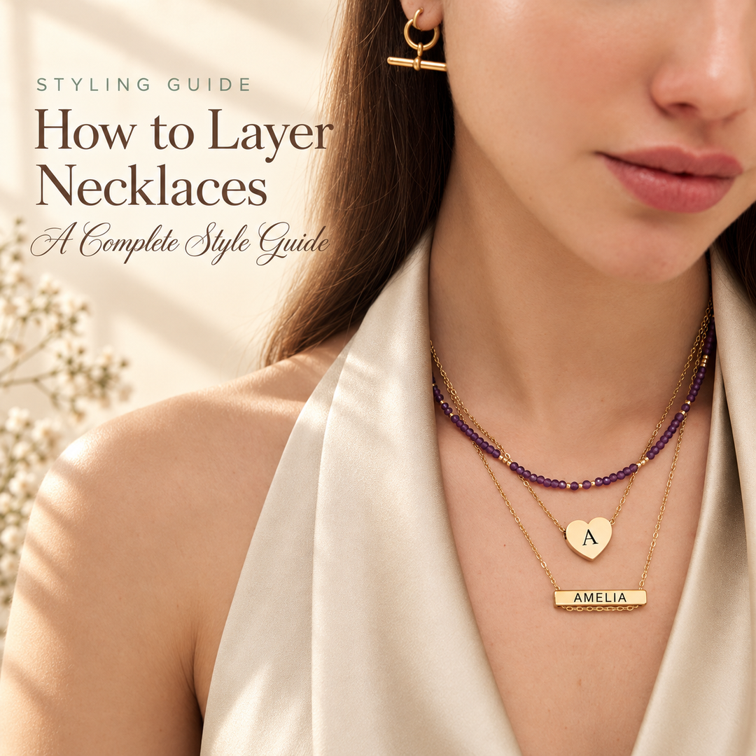 How to Layer Necklaces — a model wearing an amethyst beaded choker layered with an initial disc and an engraved name bar necklace