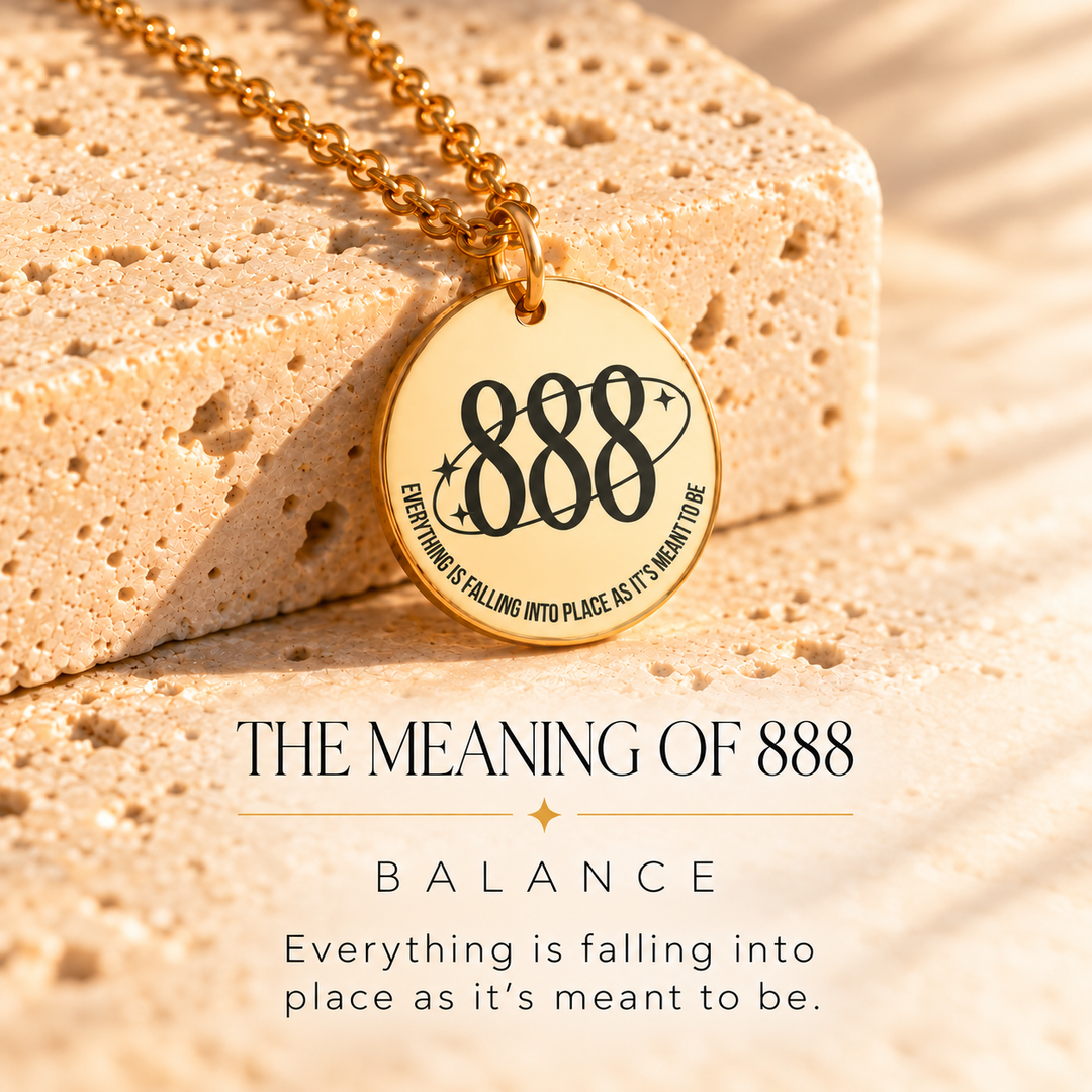Round gold 888 angel number pendant on sunlit stone, engraved 'everything is falling into place' — 888 means balance