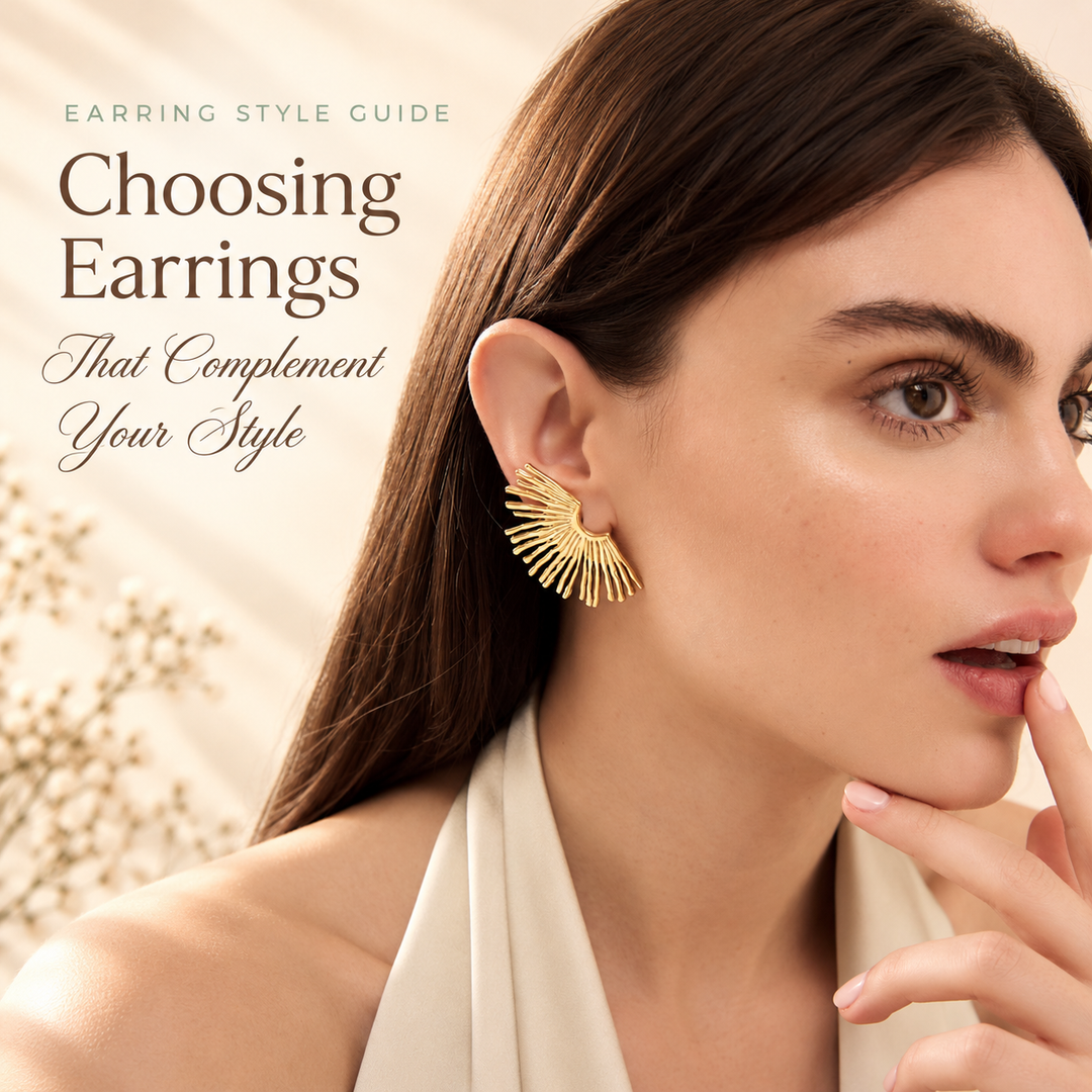 Choosing Earrings That Complement Your Style — a model wearing a gold sunburst fan stud earring, hand resting at her chin