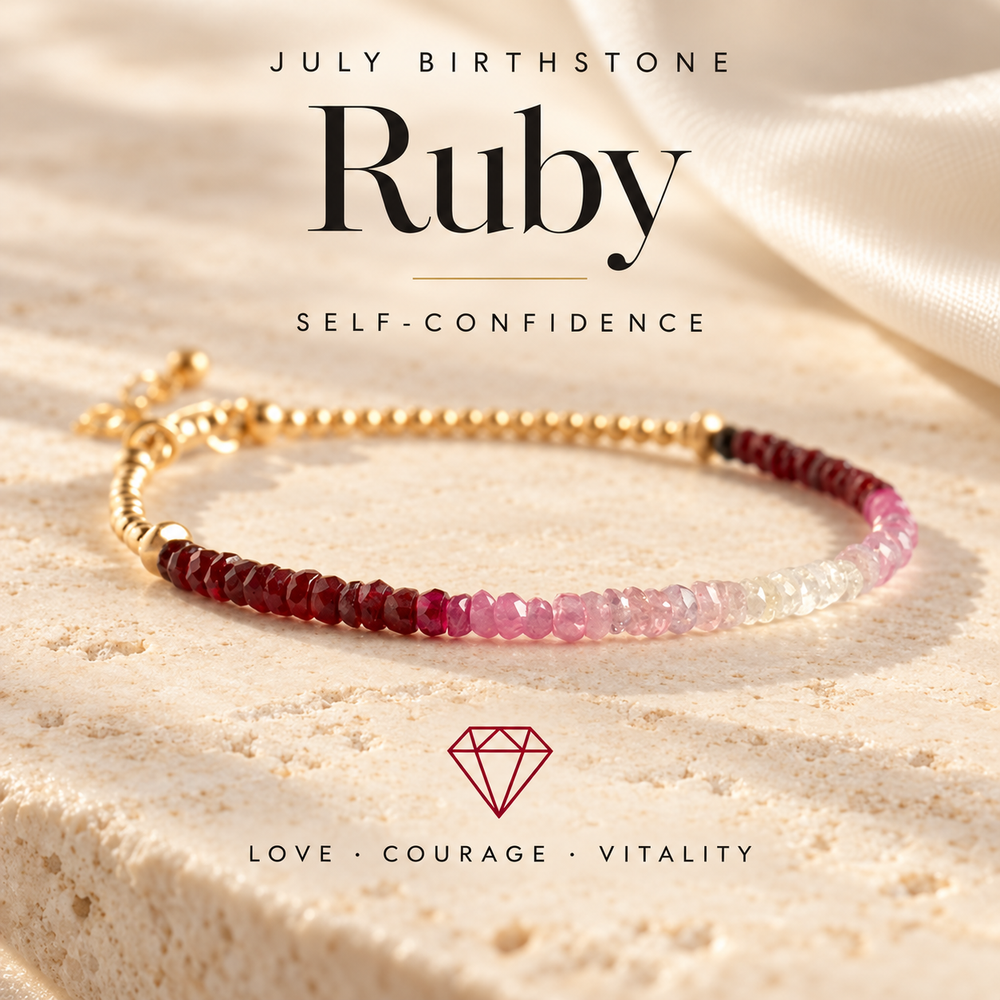 July Birthstone Ruby, for self-confidence — a graduated ruby bracelet running deep red through pink to pale gold beads, captioned Love · Courage · Vitality