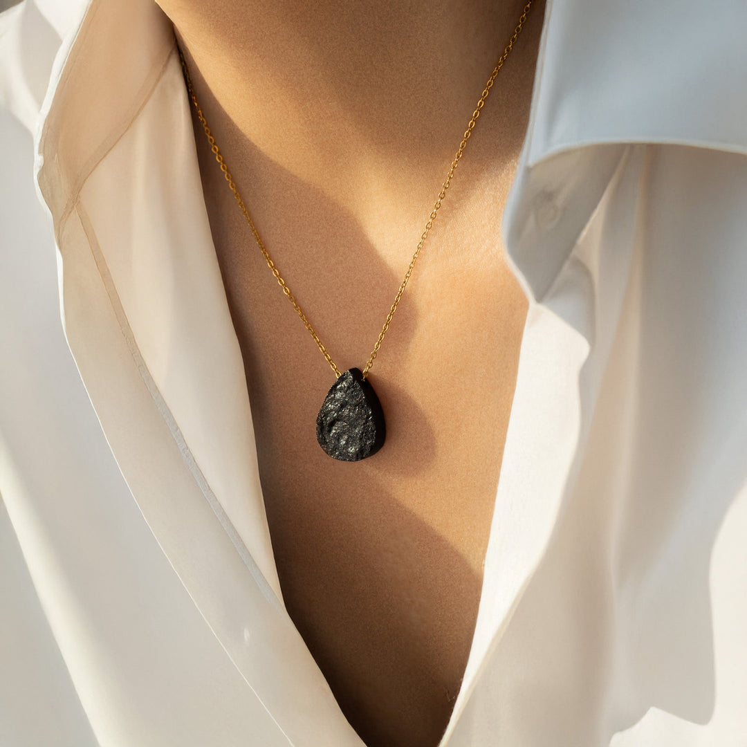 Raw black tourmaline pendant necklace by Abiza — natural protection crystal and October birthstone