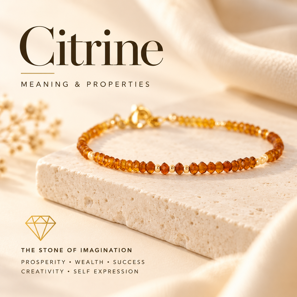 Citrine Meaning and Properties, the Stone of Imagination — an amber citrine and gold beaded bracelet on travertine, captioned Prosperity · Wealth · Success · Creativity · Self Expression