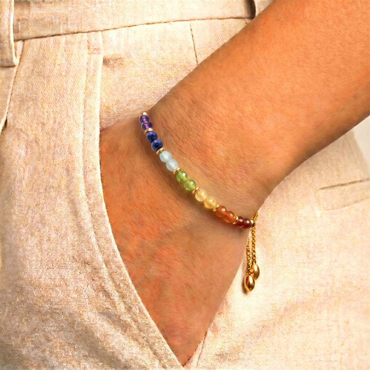 Model wearing Abiza healing chakra bracelet on wrist