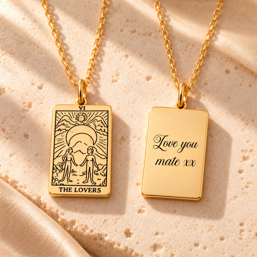 The Lovers tarot necklace in gold, shown front and engraved reverse