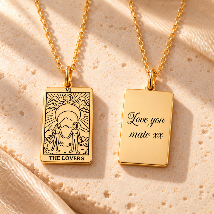 The Lovers tarot necklace in gold, shown front and engraved reverse