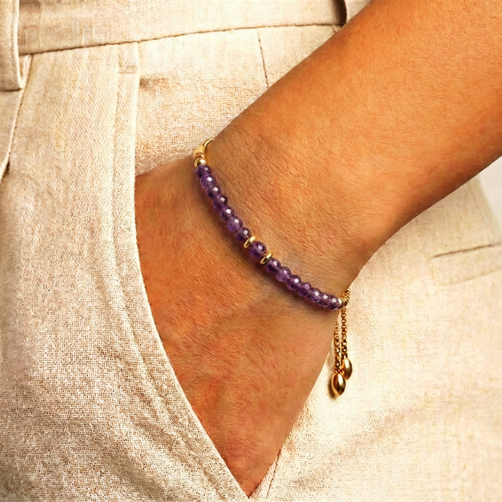 Model wearing Abiza February birthstone amethyst bracelet on wrist