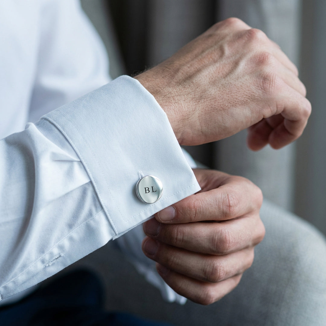 Man wearing personalised silver best man cufflinks on white dress shirt