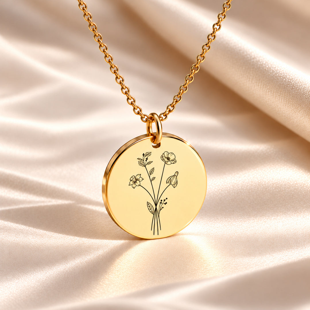 Gold birth flower necklace with four birth flowers engraved as one bouquet