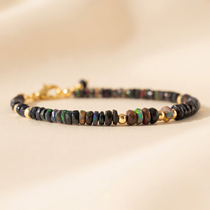 14K gold filled black opal bracelet — graduated 3.5 to 5mm hand-cut faceted rondelle beads