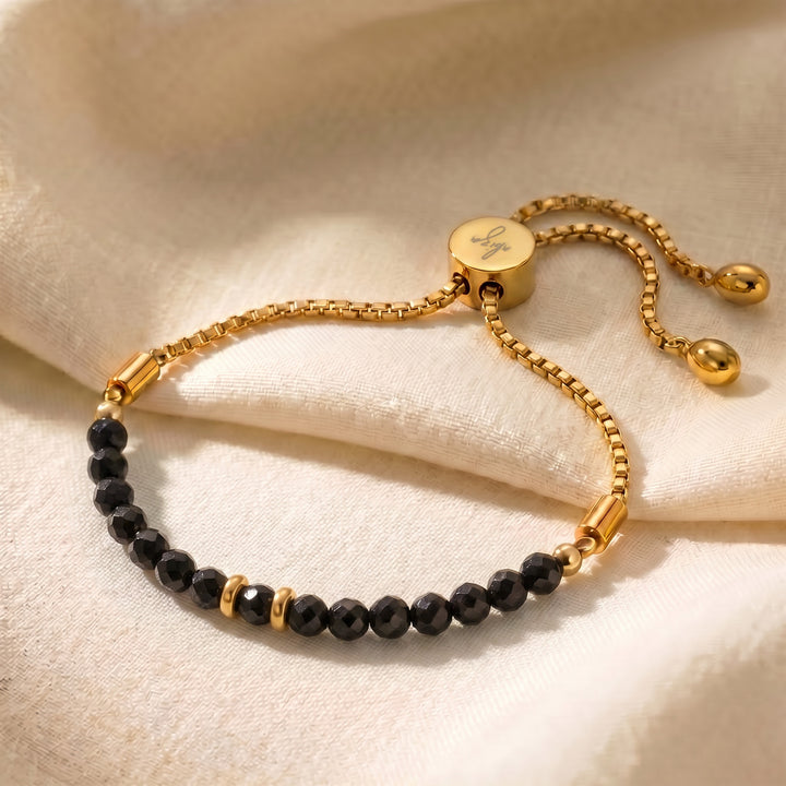 Gold October birthstone black tourmaline bracelet with 3.9mm genuine tourmaline beads on adjustable slider chain