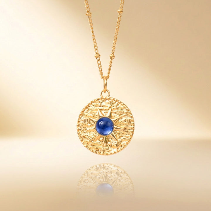 Gold blue sapphire sun necklace — September birthstone, handmade UK