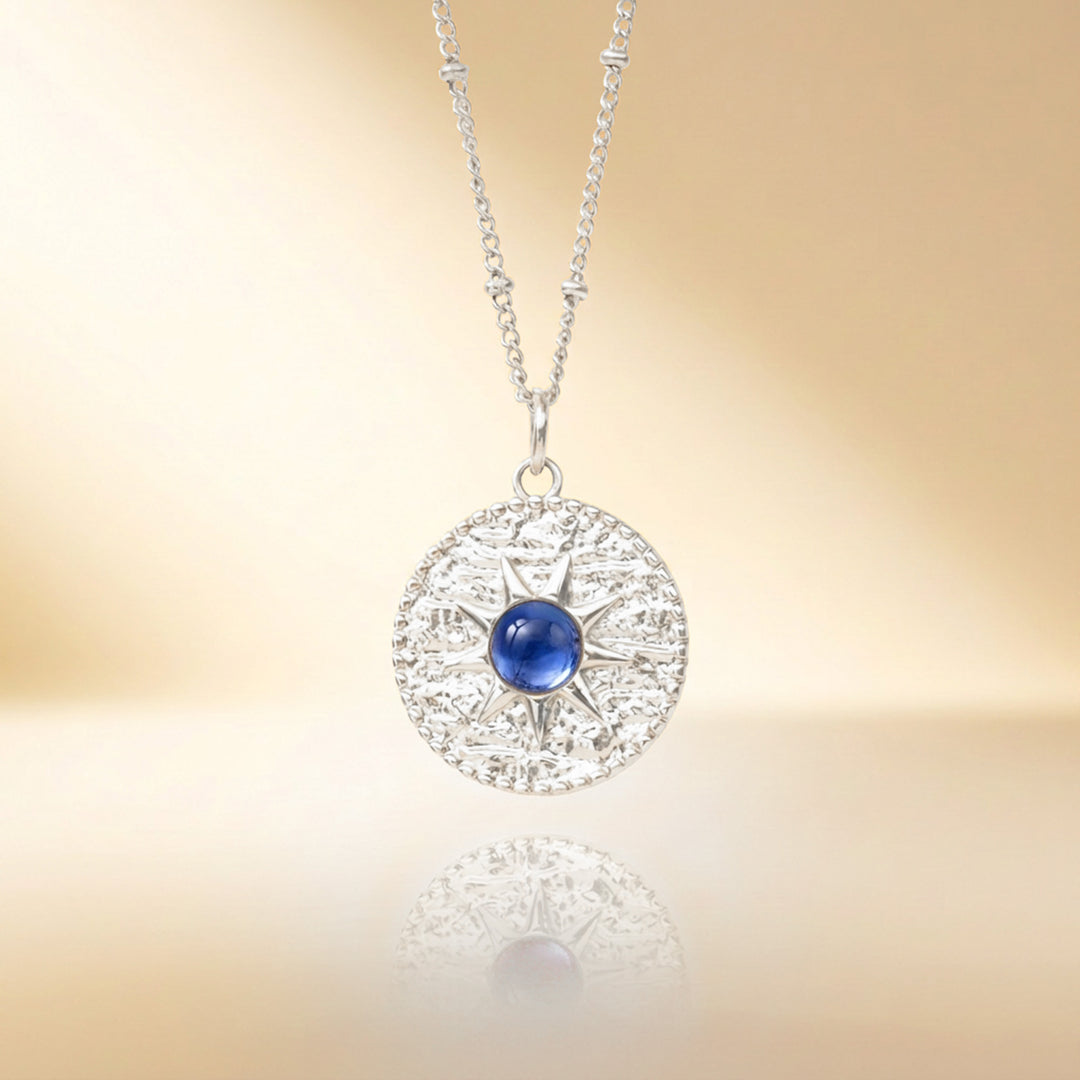 Silver blue sapphire sun necklace — September birthstone, handmade UK