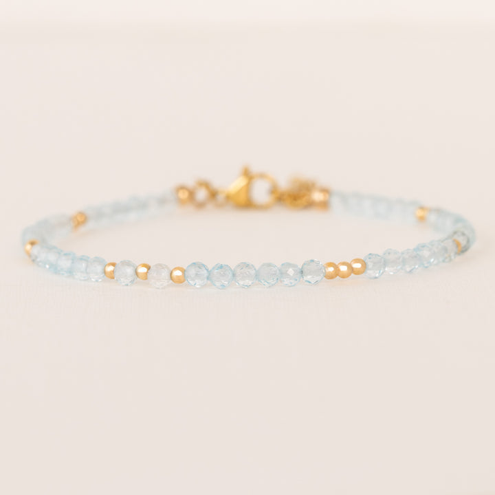 blue topaz bracelet gold