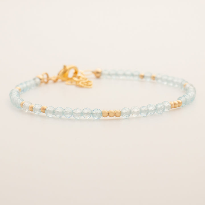blue topaz bracelet gold