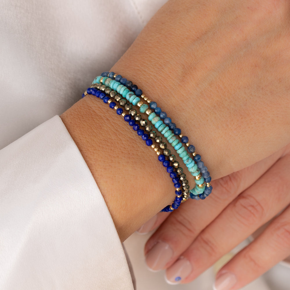 14K gold filled pyrite bracelet stacked with other Abiza bracelets