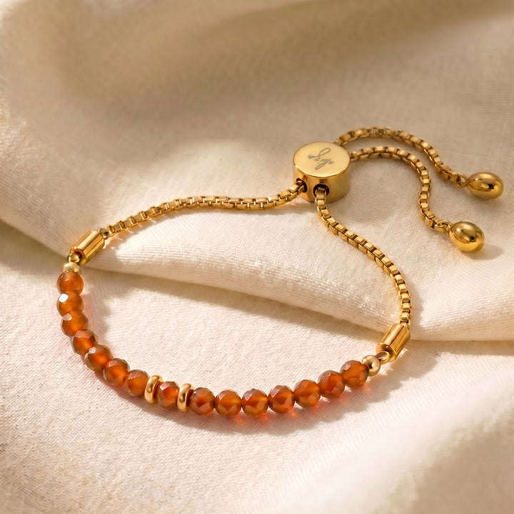 Gold carnelian bracelet with 4mm genuine warm-orange carnelian beads on adjustable slider chain