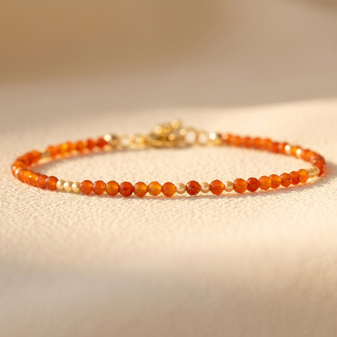Skinny Carnelian Bracelet in 14K Gold Filled — dainty 2.8mm diamond-cut Carnelian beads, beaded throughout with 1.5" extender
