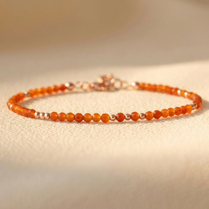 Skinny Carnelian Bracelet in 14K Rose Gold Filled — warm orange Carnelian beads in a rose gold finish, beaded throughout

