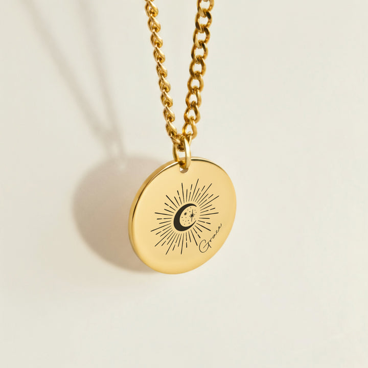 Gold sun moon and stars name necklace with engraved disc pendant