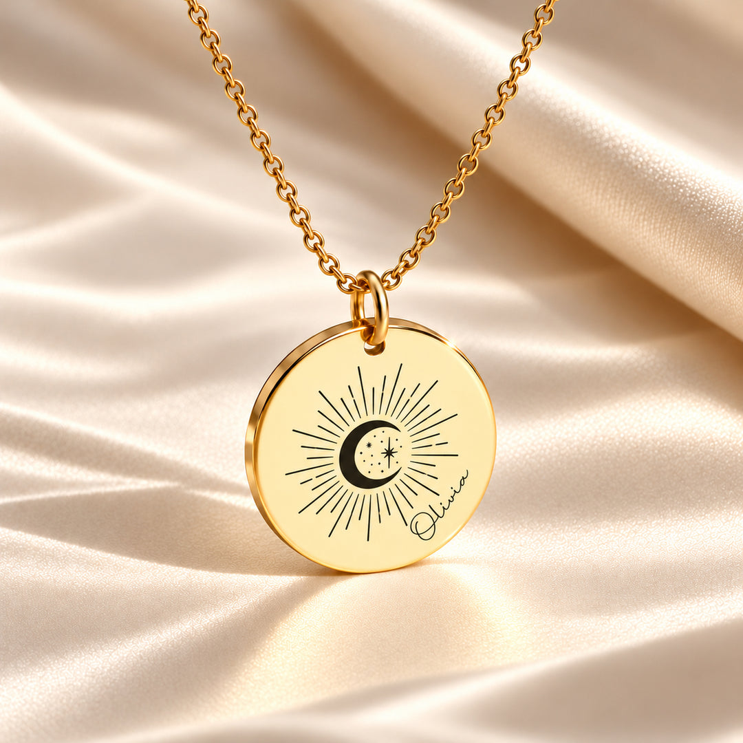 Gold sun moon and stars necklace engraved with the name Olivia