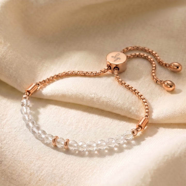 Rose gold April birthstone clear quartz bracelet with genuine clear quartz beads, adjustable slider chain