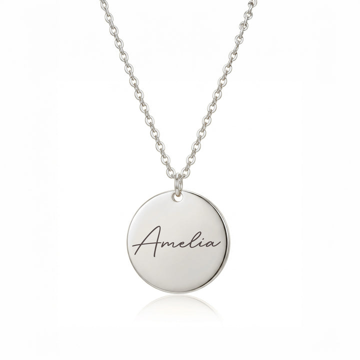 Silver personalised disc necklace engraved with Amelia