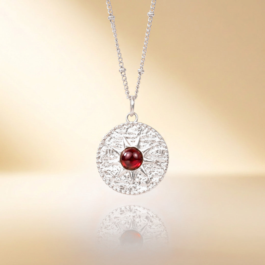 Silver garnet sun necklace — real Mozambique garnet, handmade UK