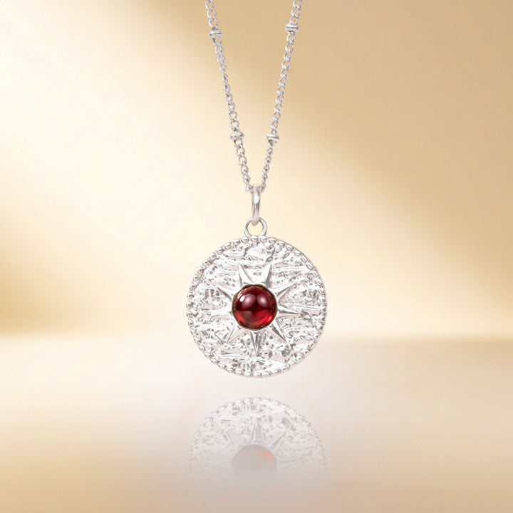 Silver garnet sun necklace — real Mozambique garnet, handmade UK