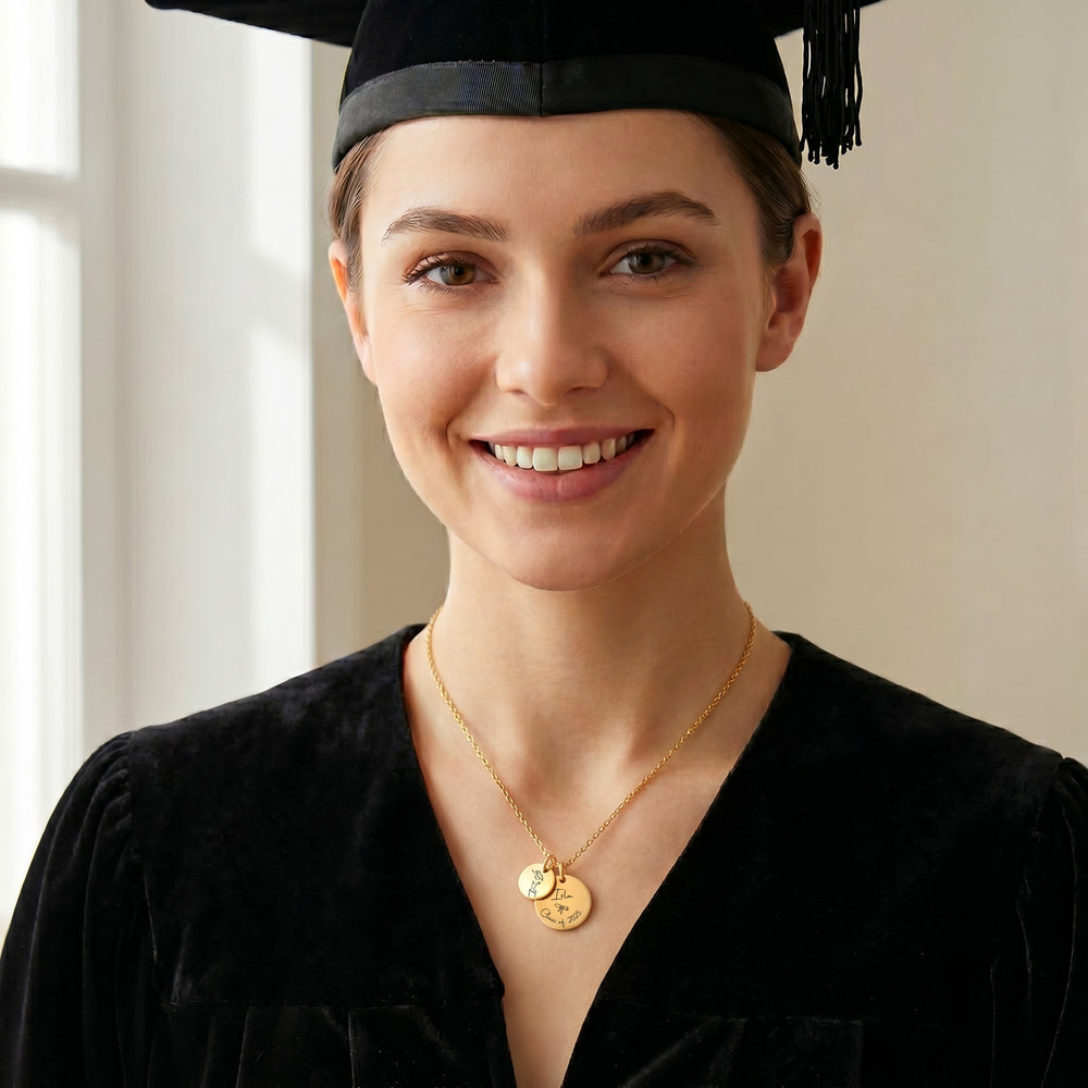 Model wearing personalised graduation necklace in 18K gold with engraved name and year