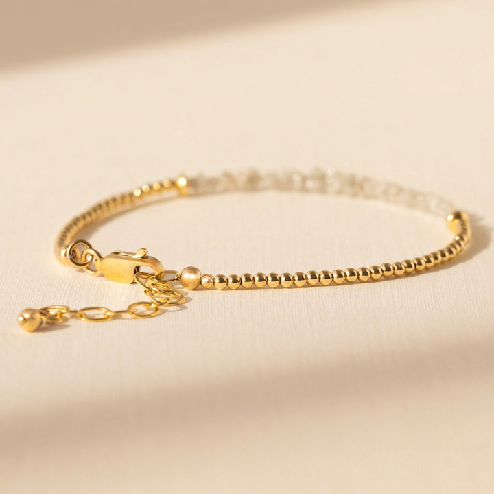 Clasp and extender detail — 2mm metal beads strung to lobster clasp with extender chain