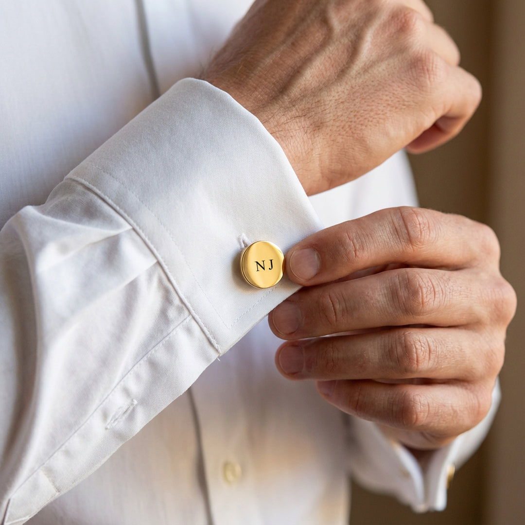 groomsman wearing personalised gold cufflinks with engraved initials