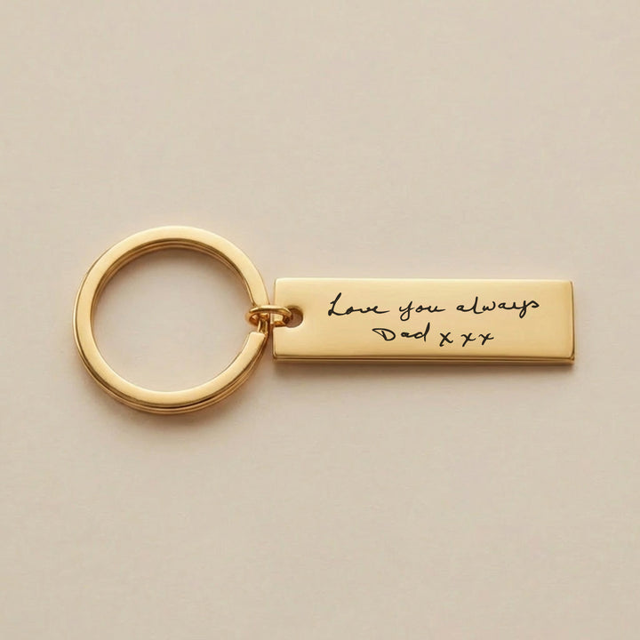Gold handwriting keyring engraved with Love you always Dad xxx
