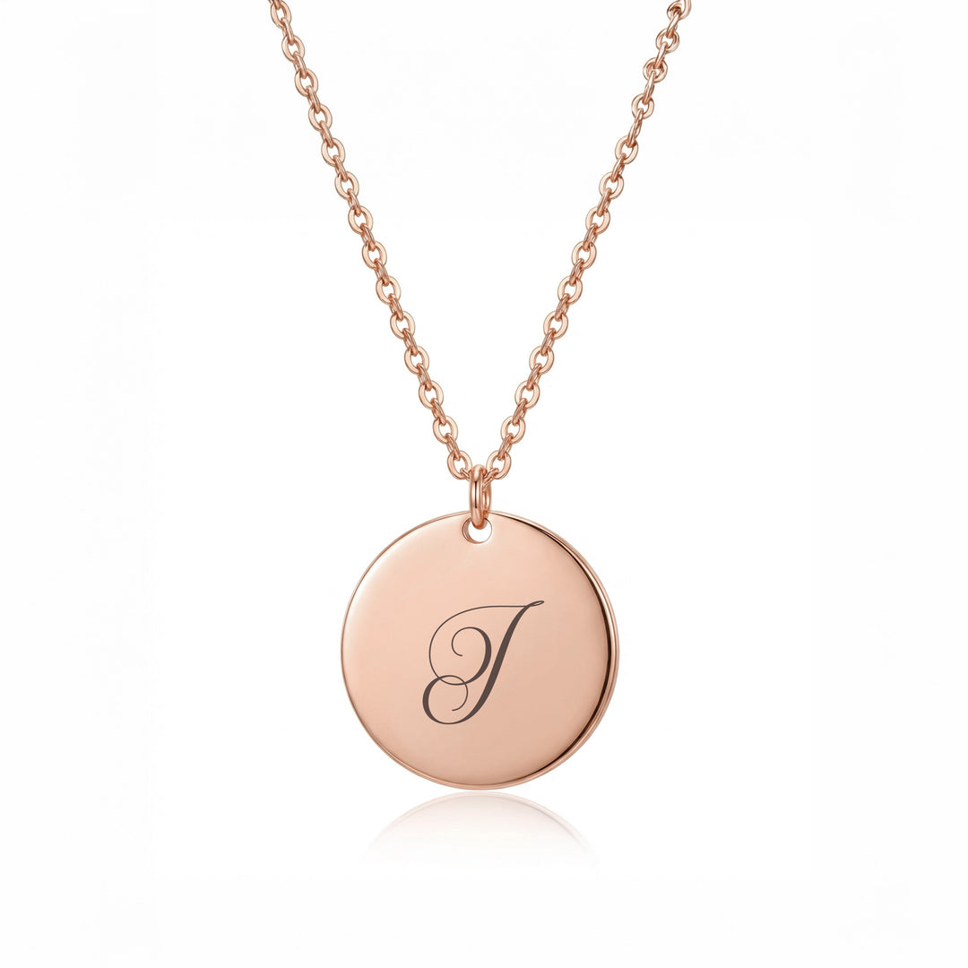 Rose gold initial disc necklace with engraved script letter J