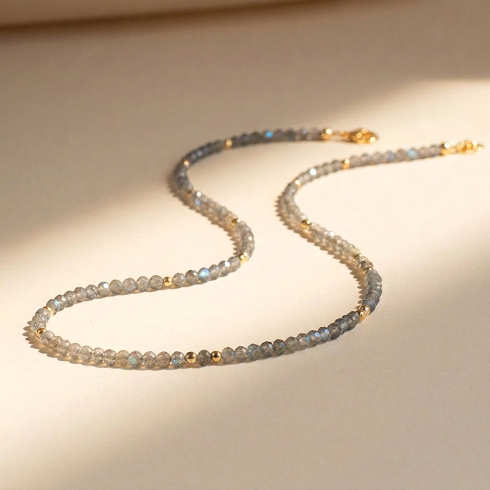 14K gold filled labradorite necklace close-up — 3mm diamond-cut beads with labradorescence detail