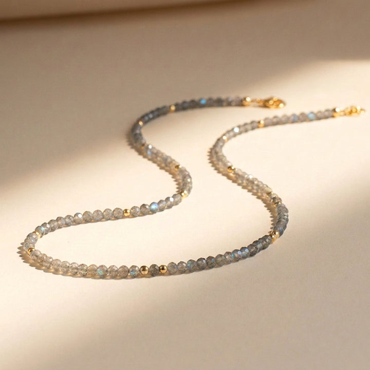 14K gold filled labradorite necklace close-up — 3mm diamond-cut beads with labradorescence detail