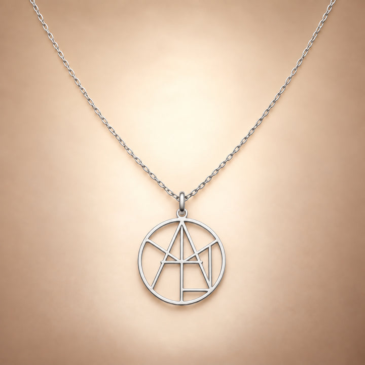 Silver monogram name necklace with the name Aylin cut through the circle