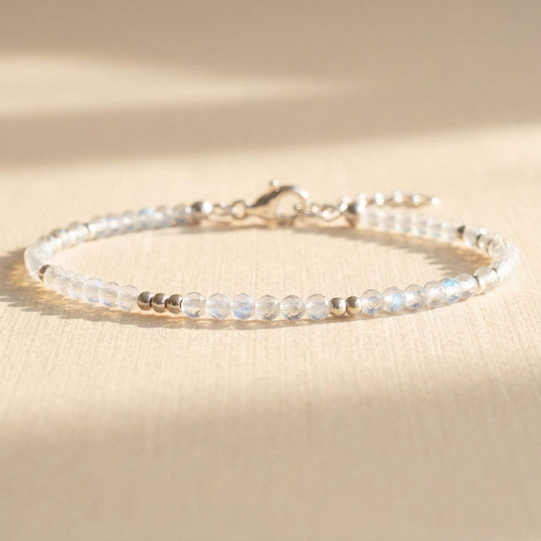 Skinny rainbow moonstone bracelet in sterling silver, handmade in our Chester studio with real 2.5–3mm moonstone beads