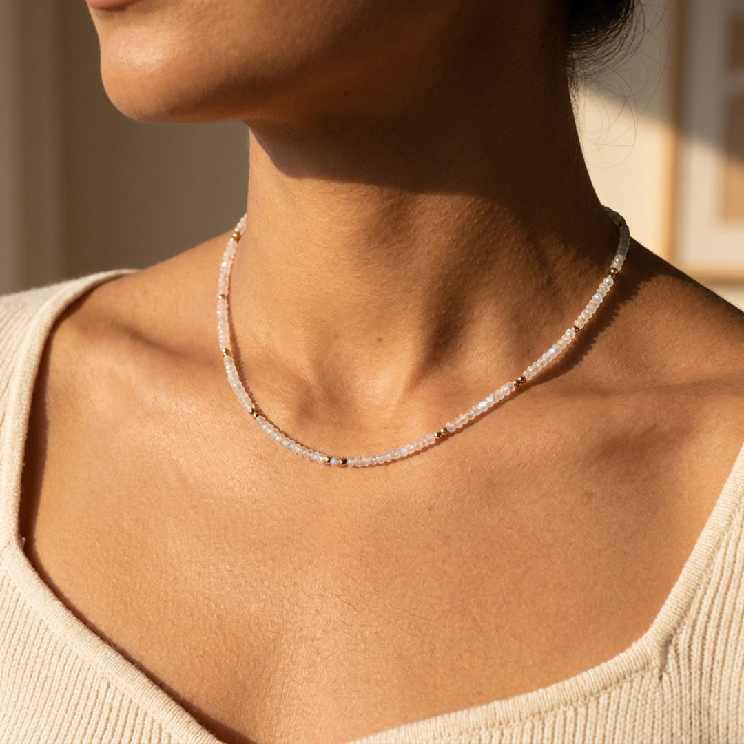 Real rainbow moonstone necklace on model — hand-strung in our Chester studio, June birthstone