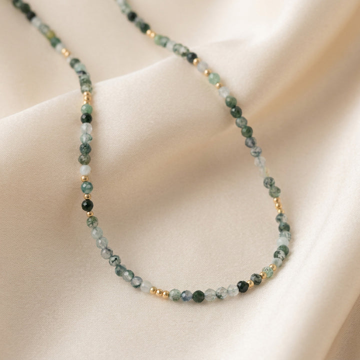 14K gold filled moss agate necklace close-up — 3.2mm diamond-cut beads with natural moss-like inclusions