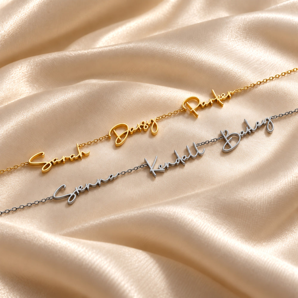 Gold and silver multiple name necklaces, each with four names in script