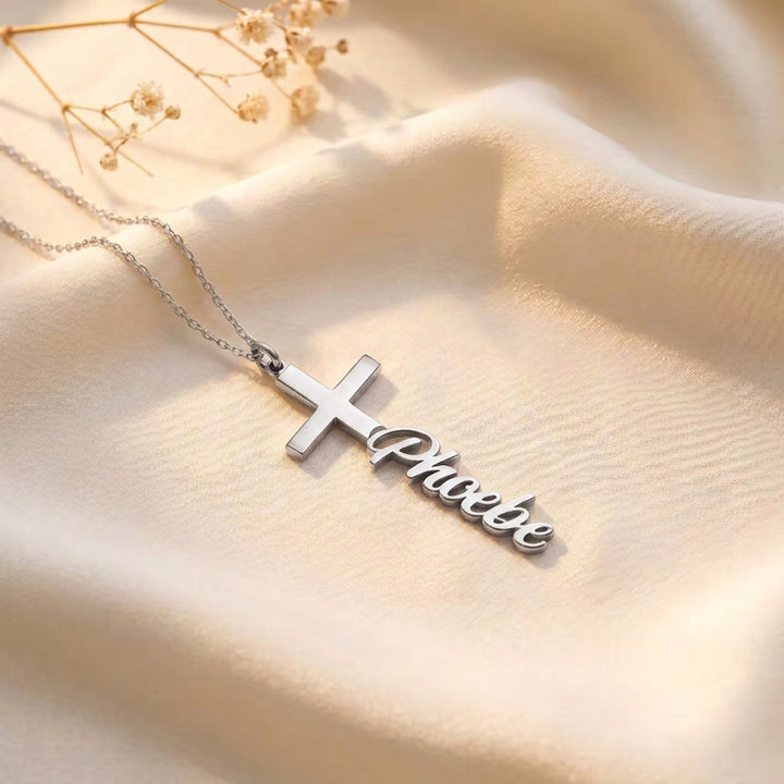 Silver personalised cross necklace with the name Phoebe