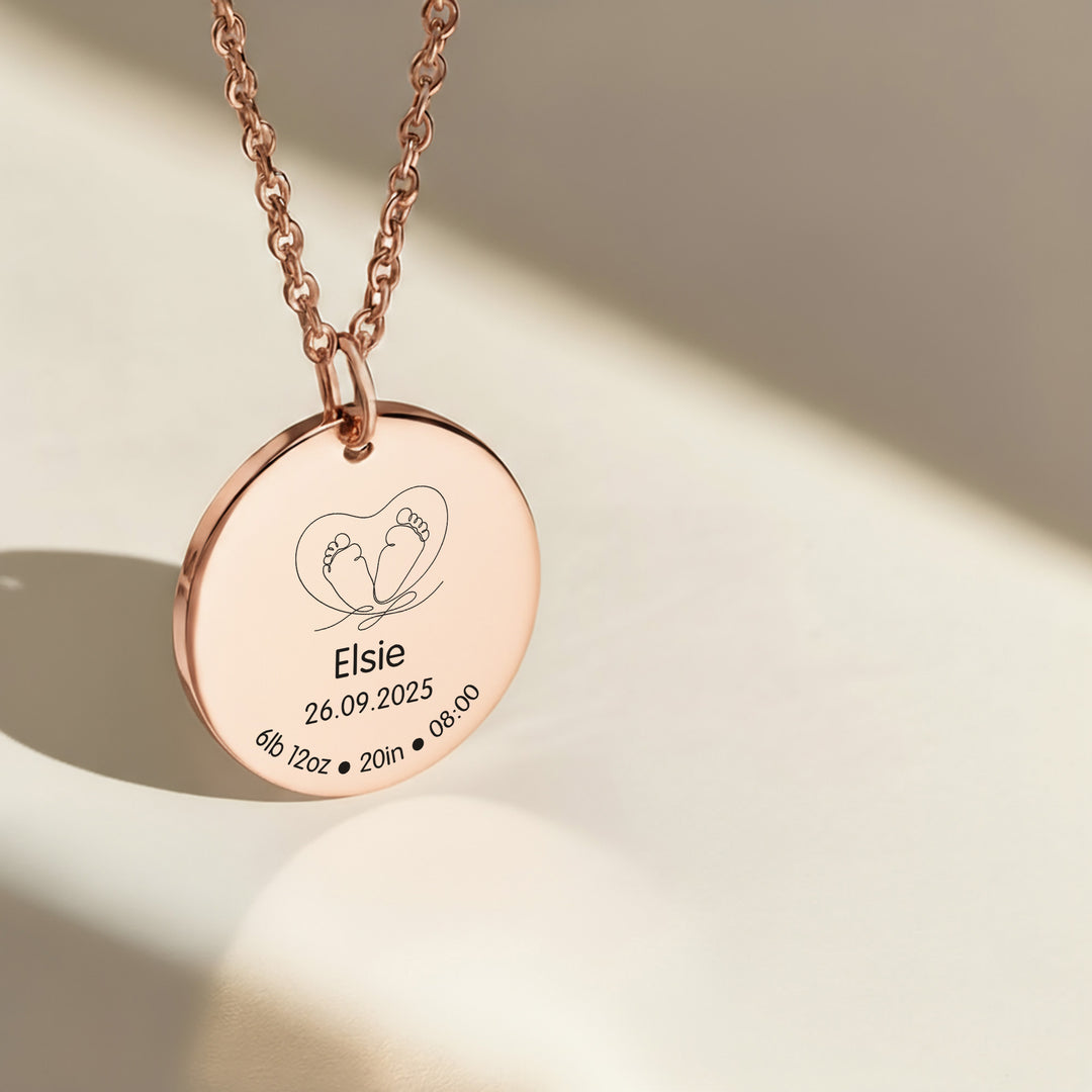 Rose gold new mum necklace with a round pendant engraved with &