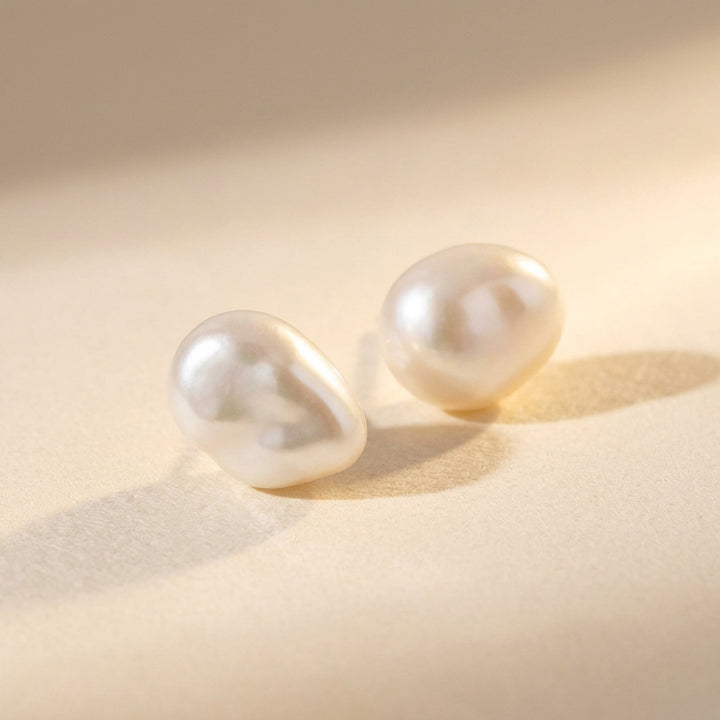 Real keshi freshwater pearl stud earrings — each pearl uniquely shaped, sterling silver posts and butterfly backs