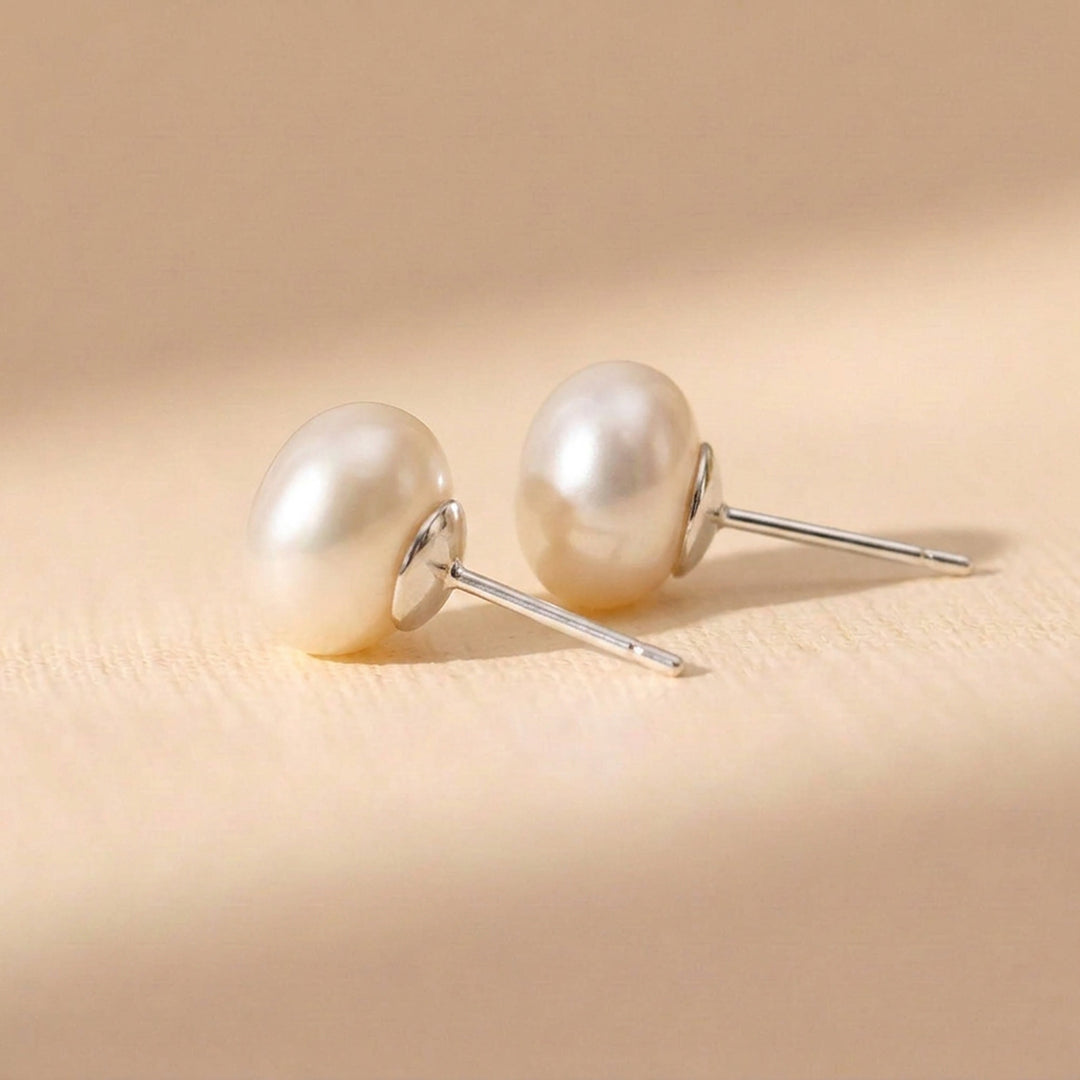 Real keshi freshwater pearl stud earrings — each pearl uniquely shaped, sterling silver posts and butterfly backs