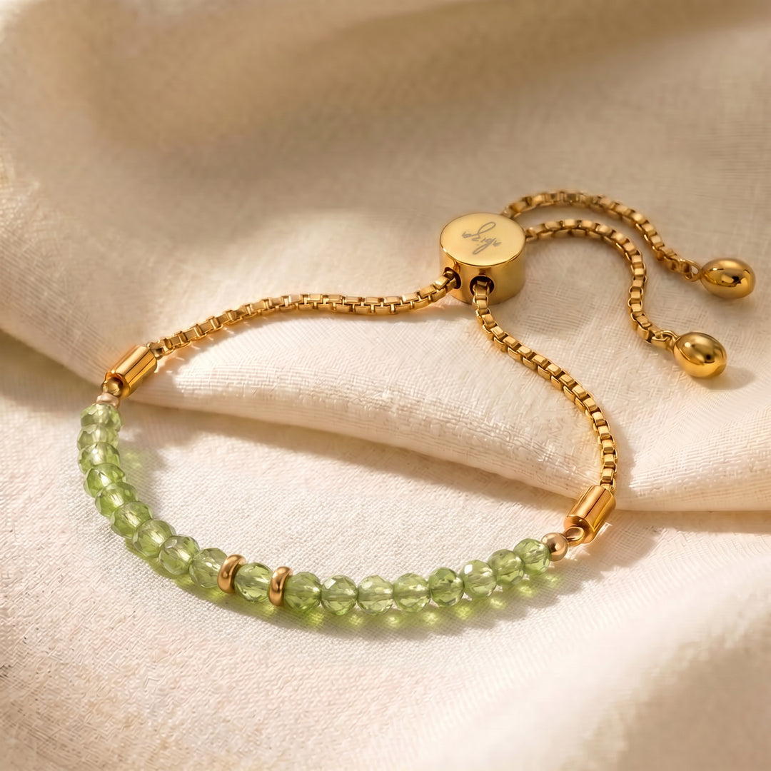 Gold August birthstone peridot bracelet with 4mm genuine green peridot beads on adjustable slider chain