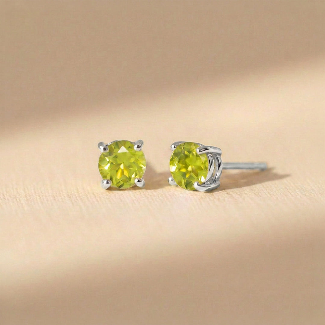 Real 4mm peridot stud earrings on sterling silver posts and butterfly backs