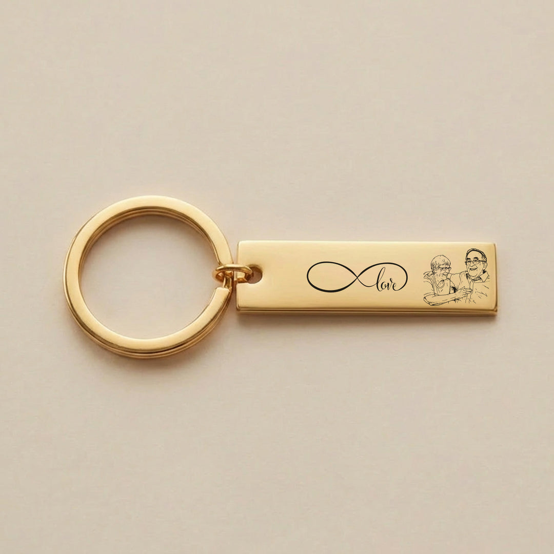 gold photo keyring with infinity love engraving and custom couple illustration