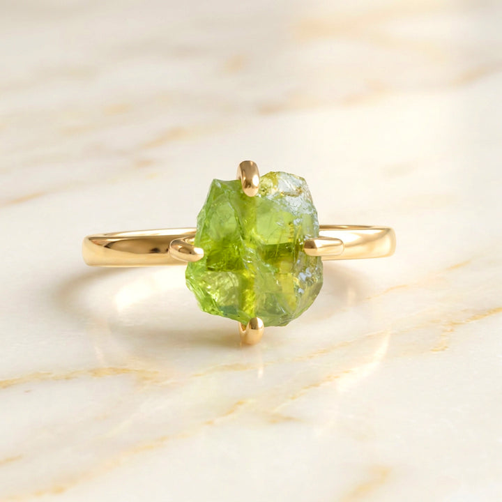 Gold vermeil raw peridot ring — August birthstone with natural uncut stone — four-claw setting on 2mm band