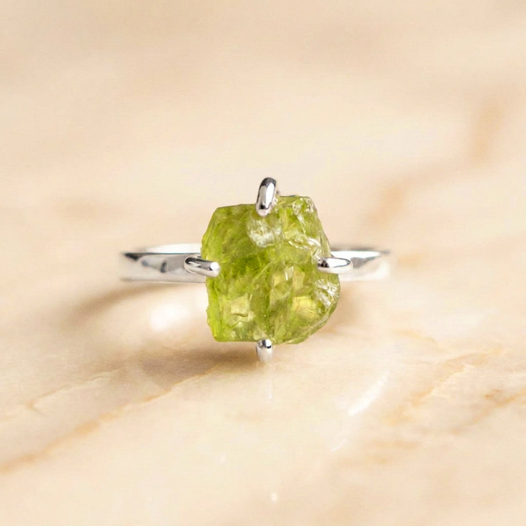 Sterling silver raw peridot ring with uncut Arizona peridot on a 2mm band